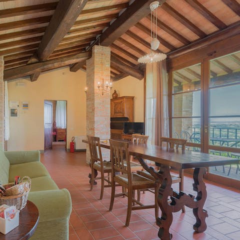 Enjoy the countryside views through the villa's floor-to-ceiling windows