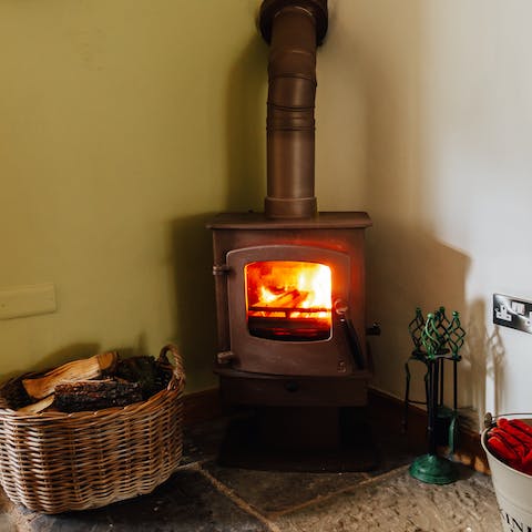 Keep the wood-burning stove alight with an unlimited supply of wood and kindling