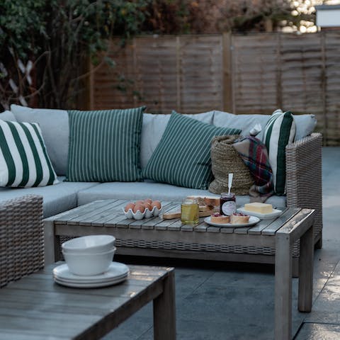 Relax on the patio with a cup of tea and plate of biscuits