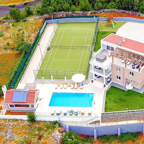 Unleash your inner Federer or Osaka on your private tennis court
