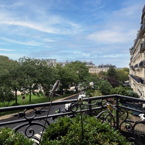 Pad out to the small balcony and admire the Avenue Foch views