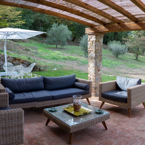 Take your morning coffee and a good book out to the lounge area on the covered terrace