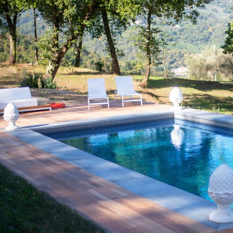 Relax on a poolside lounger and soak up the sun before enjoying a dip