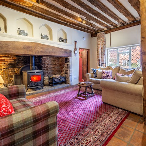 Light up the log-burner in the period inglenook fireplace
