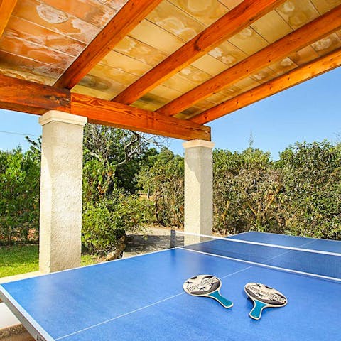 Play a few rounds of ping pong under the pergola