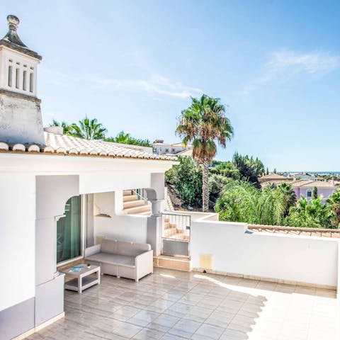 Admire views of the Algarve from one of the home's terraces