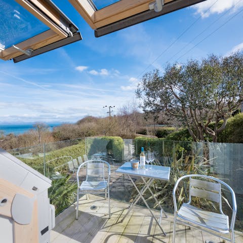 Sip a glass of wine on the balcony on sunny evenings