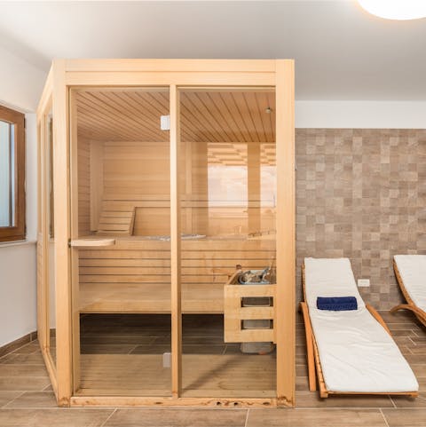 Spend relaxing hours in the home's private sauna
