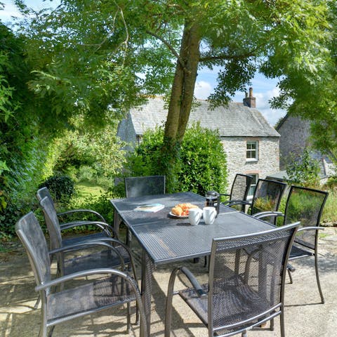 Enjoy a cream tea in the garden (remember it's jam before cream on your scone when in Cornwall)