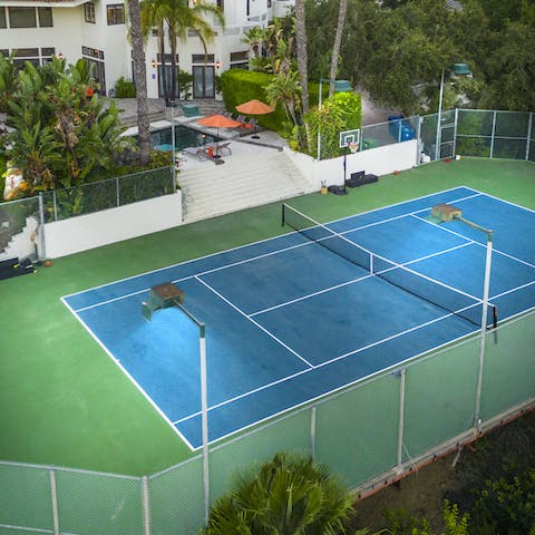 Head out onto the tennis court and stay active with a friendly game