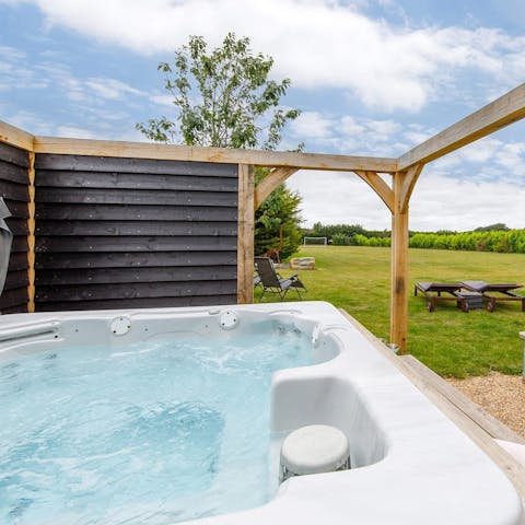 Relax in the hot tub after a day exploring the West Sussex coast