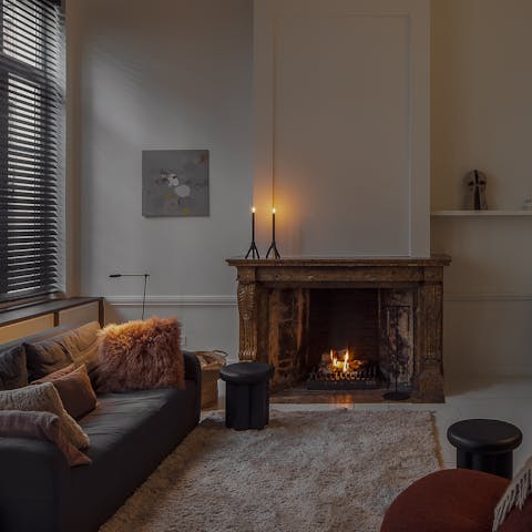 Have a cosy evening in around the atmospheric fireplace