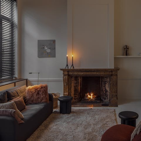 Have a cosy evening in around the atmospheric fireplace