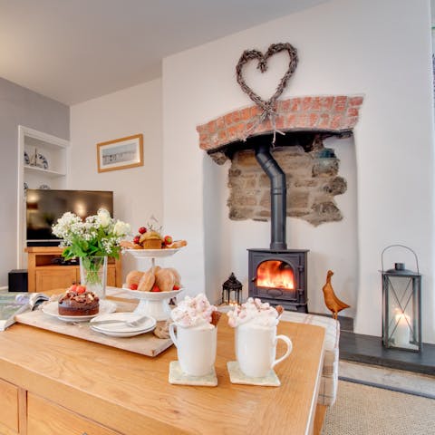 Curl up with a hot chocolate by the wood-burning stove