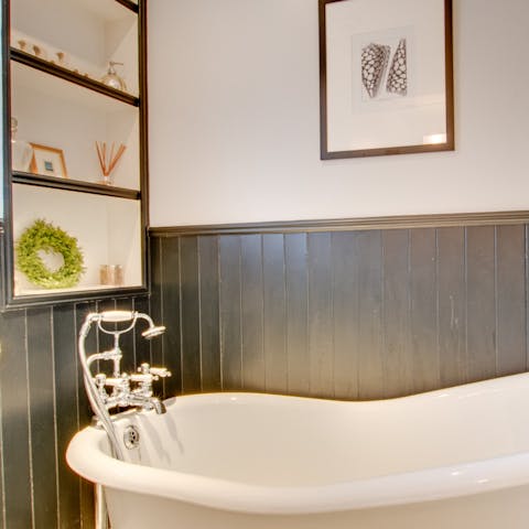 Run yourself an indulgent bubble bath in the luxurious clawfoot tub