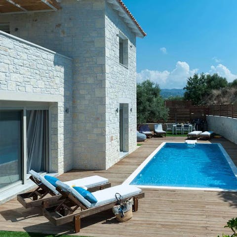 Relax by the pool with a good book before enjoying a refreshing dip