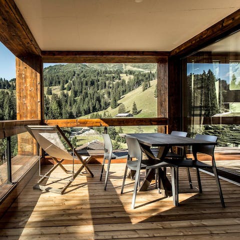 Take in the picturesque mountain views from the veranda 