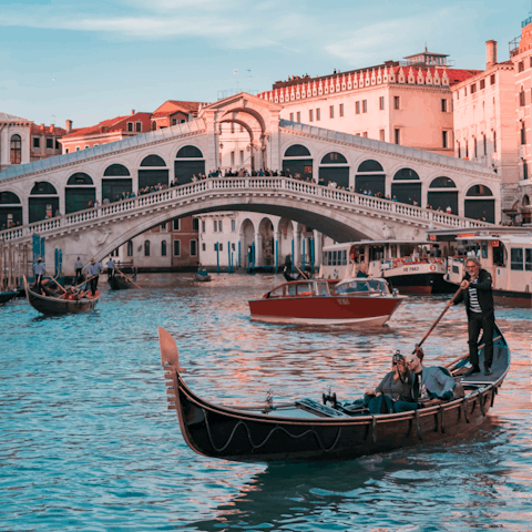 Tour the famous canals of Venice by gondola