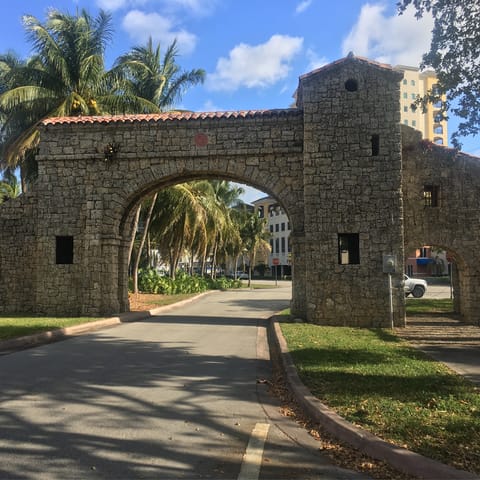 Explore Coral Gables with its tree-lined boulevards and historical landmarks