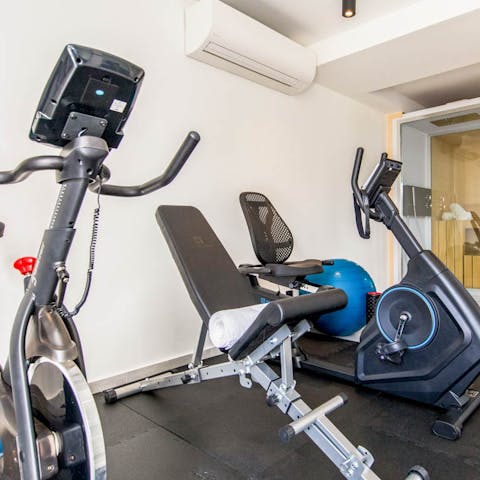 Work out and keep fit in the private gym complete with cross-trainer and exercise bike