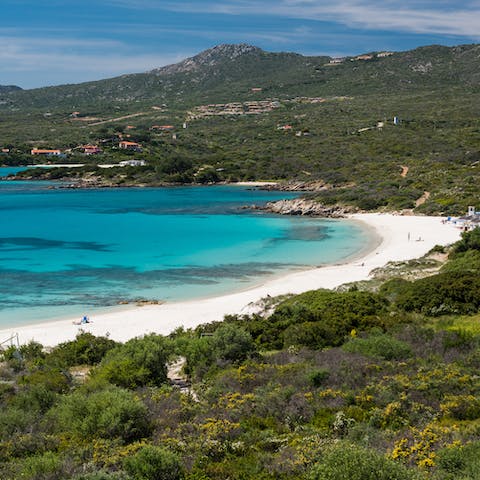 Soak up the Sardinian sunshine on White Beach, no more than a five-minute drive away