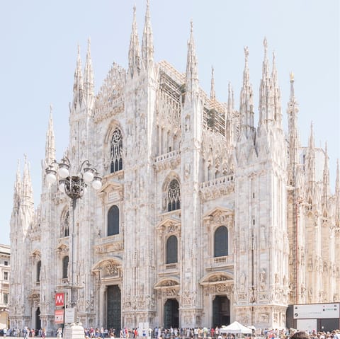 Walk fifteen minutes to the Duomo at the centre of Milan
