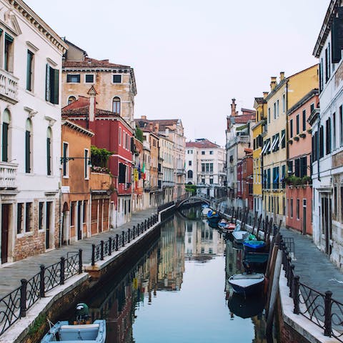 Stay in an apartment situated right next to a stretch of the city's famous canals