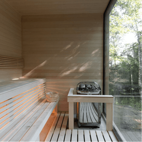 Rejuvenate in your sauna overlooking the forest