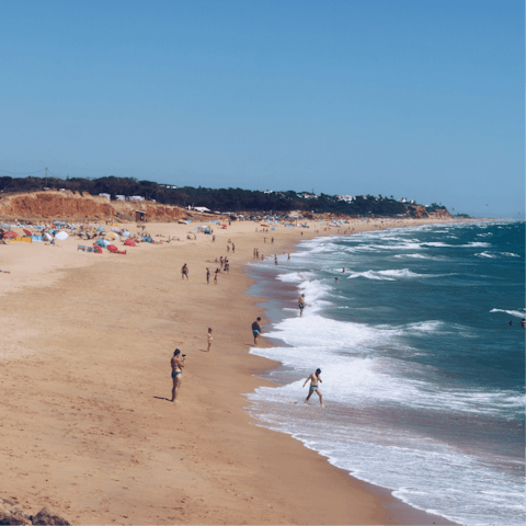 Drive to Quarteira beach for a day on the coast
