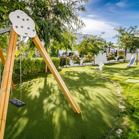 Let the kids run wild on the play area included on the property