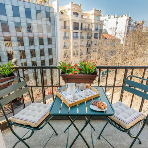 Enjoy an alfresco breakfast out on the balcony