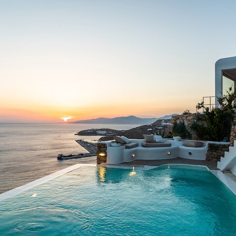 Get comfy on the pool deck and witness a spectacular sunset