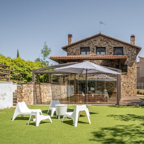 Sip a glass of Rioja outside on the grassy lawn when the sun is shining