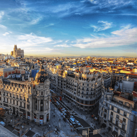 Take a day trip into the vibrant city of Madrid, less than an hour's drive away