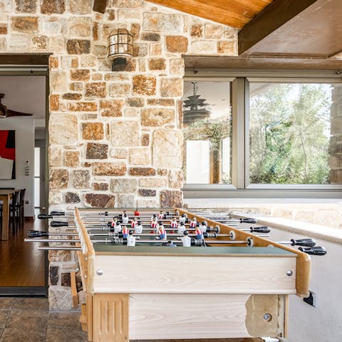Challenge your guests to a friendly game of table football
