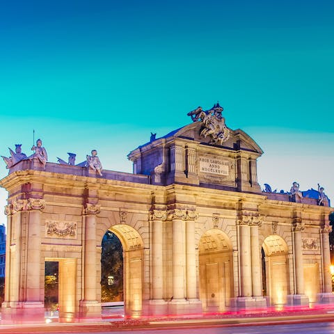 Head over to the nearby monument of Puerta de Alcalá