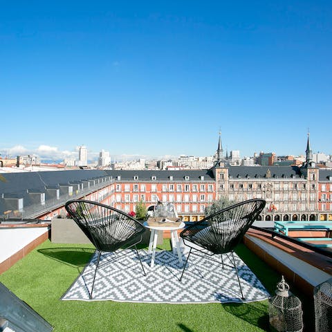Sip a sundowner on the private roof terrace while taking in views of Plaza Mayor below