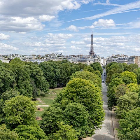 Enjoy a postcard view of the Eiffel Tower from the balcony 