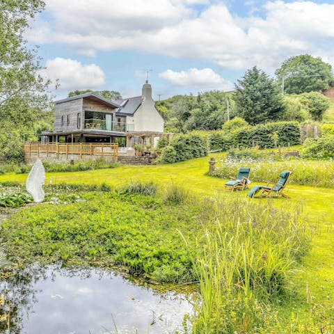 Relax by the pond as the quiet of nature surrounds you