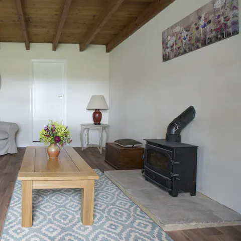 Get a fire going in the cottage's wood-burner to keep things cosy