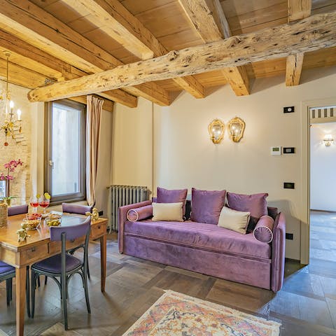 Kick back on the velvet sofa with a glass of Italian wine after a day of exploring
