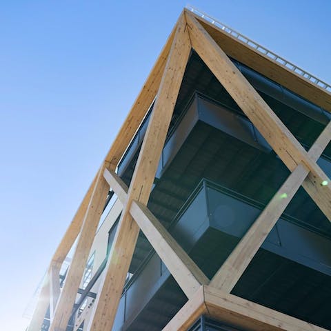 Admire the striking timber beams on the exterior of the building