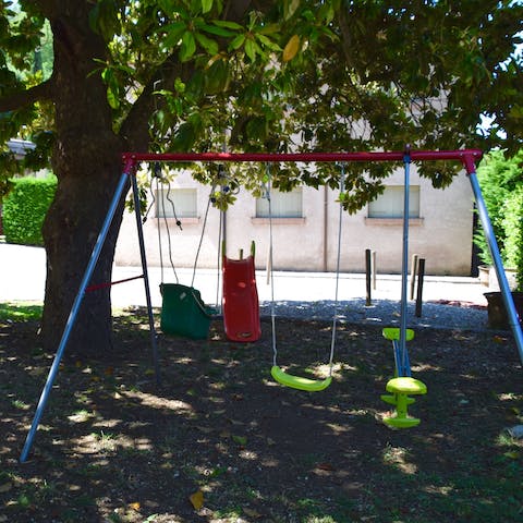 Keep the kids entertained with the shaded swing set