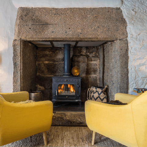 Get cosy by the fireplace