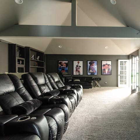 Organise a movie night in style in the home theatre room