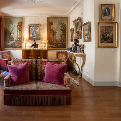 Browse the pieces of classical art in gilded frames throughout the home