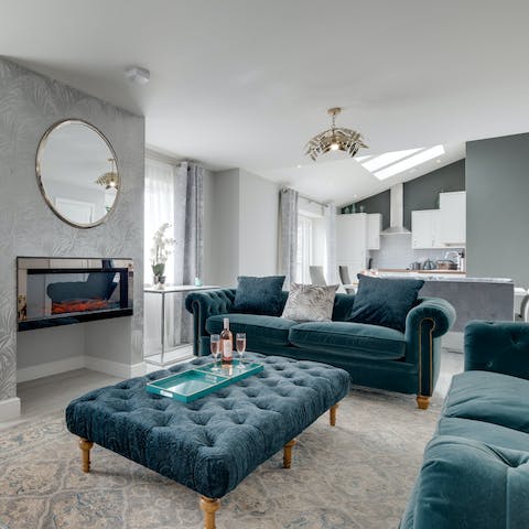 Get cosy in the living room with a glass of wine after a busy day