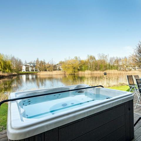 Sink into the private hot tub out on the deck and feel yourself unwind