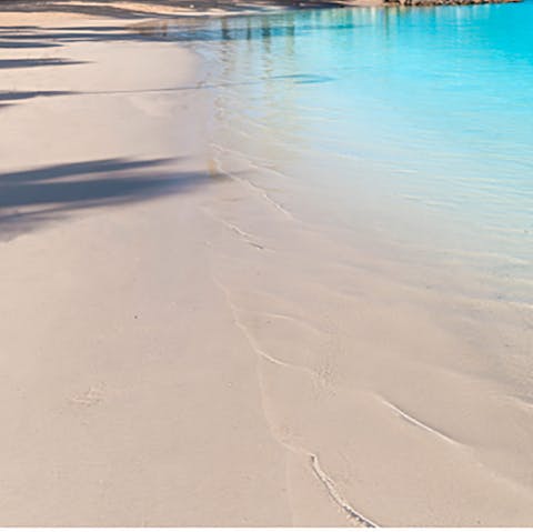 Spend the day on the white sands of Alcudia Beach, a ten-minute drive away