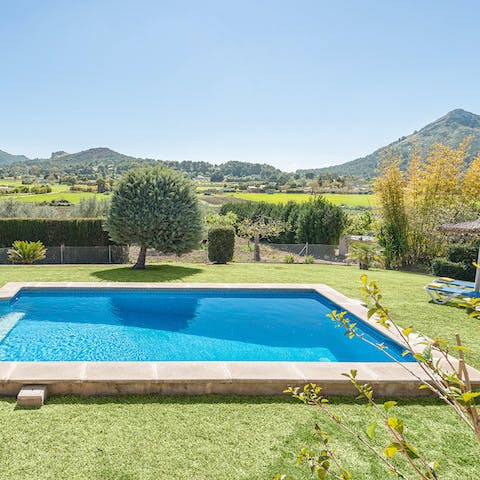 Admire the mountain views from your private pool
